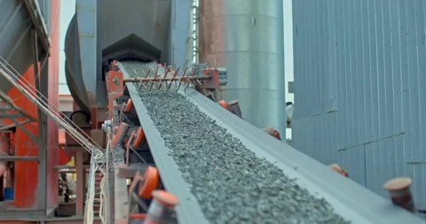 Construction stone and crushed stone is lifted by a conveyor belt into a bunker Stock-Footage 158403948
