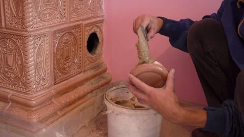 Construction of a stove from tiles Stock Footage 269643251