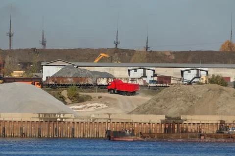 Construction structures on the banks of the river. Stock Photos