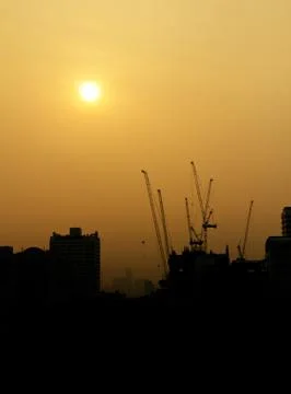 Construction at sunrise silhouette Stock Photos