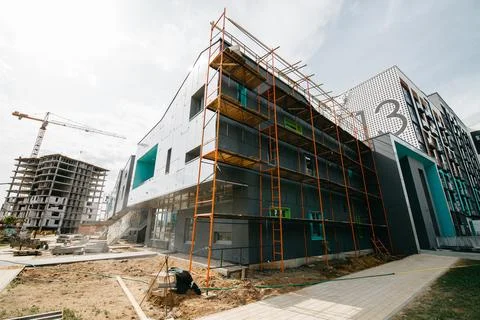 Construction of a super modern, stylish school in a residential neighborhood Stock Photos