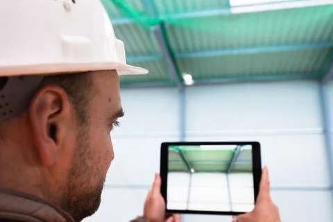 Construction supervisor with digital tablet on site Stock Photos
