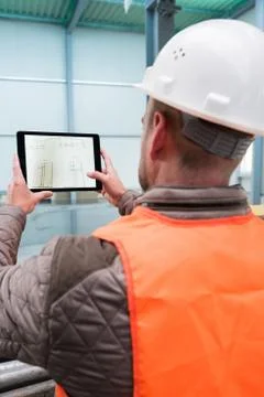 Construction supervisor with digital tablet on site Stock Photos