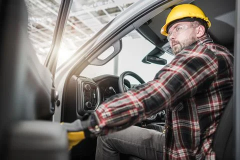Construction Supervisor Inside His Pickup Truck Foto stock
