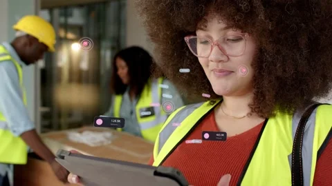 Construction supervisor using tablet on site, creating floating numeric metrics Stock Footage 332981666