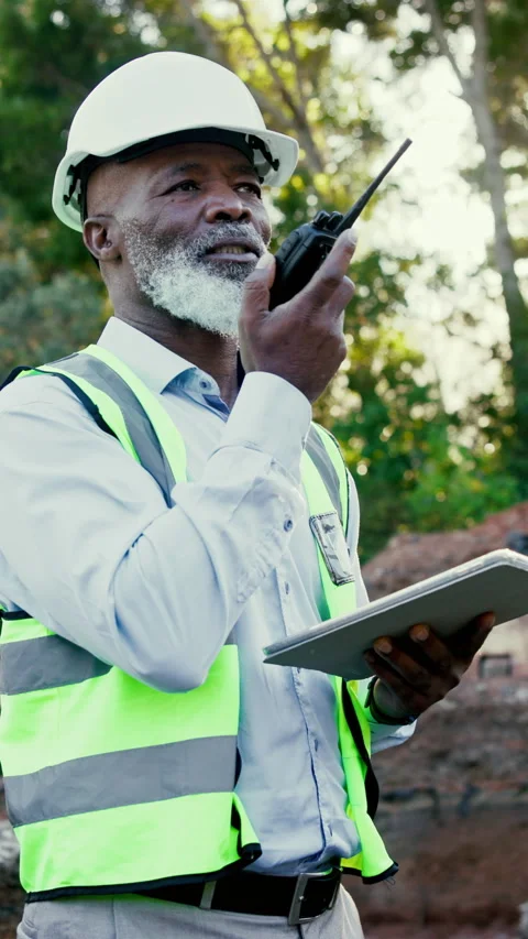 Construction, tablet or black man on site with radio, safety check or inspection Stock Footage 340451780