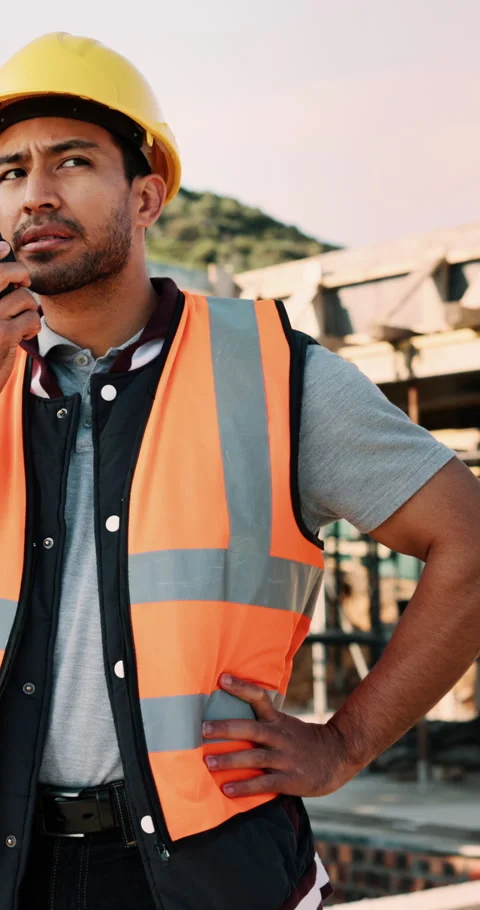 Construction, talking and man with radio at site for communication, feedback and Stock Footage 336247659