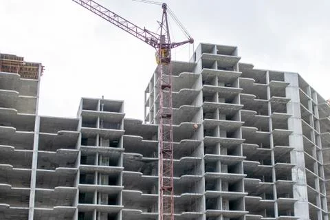 The construction of a tall frame building. Stock Photos