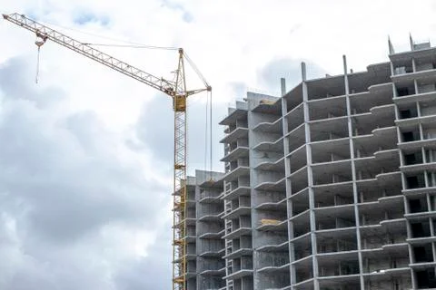 The construction of a tall frame building. Stock Photos