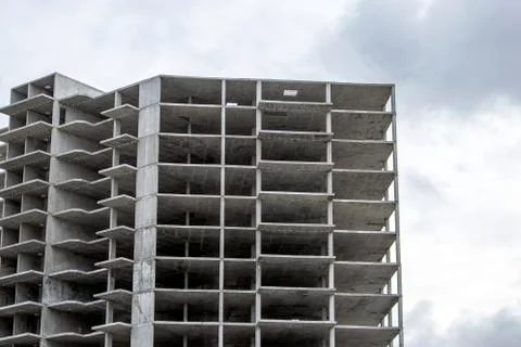 The construction of a tall frame building. Stock Photos