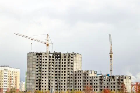 The construction of a tall frame building. Stock Photos