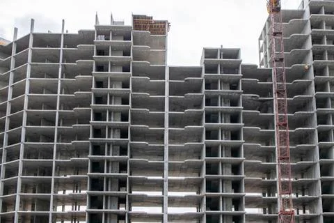 The construction of a tall frame building. Stock Photos