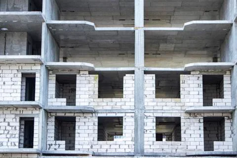 The construction of a tall frame building. Stock Photos