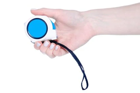 Construction tape measure in hand Stock Photos