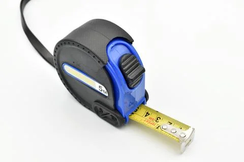 Construction tape measure for measuring objects. Stock Photos