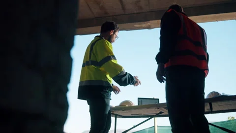 Construction, team and handshake on site with collaboration, engineering deal Stock Footage 336223825