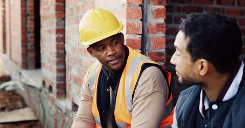 Construction, team and man with talk on site for civil engineering, building Stock Photos