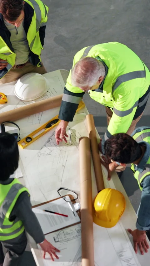 Construction, team and people with blueprint for planning, development layout or Stock Footage 342322618