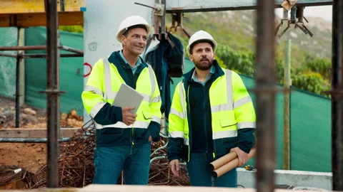 Construction, team and talk on site with inspection, tablet or engineering plan Stock Footage 336203985