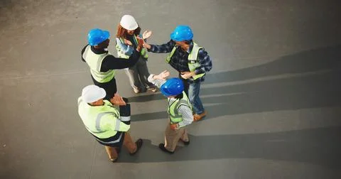 Construction, team and unity with high five in meeting or above for success Фото