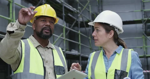 Construction team, architecture and tablet at site for maintenance, civil Stock Footage 262193794