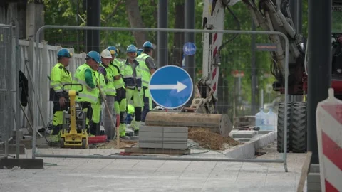 Construction Team Behind Barriers at Vilnius Road Works Stock Footage 336448960