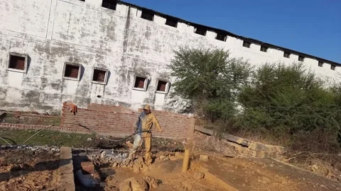 Construction Team cleaning the borewell in the rural village Stock Footage 199677228