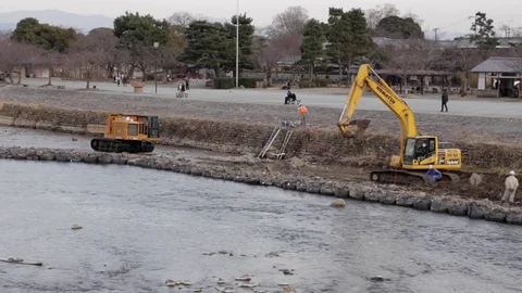 Construction Teams Move Rocks on River Stock Footage 73163853