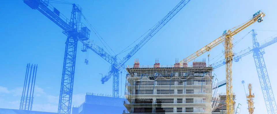 Construction technology banner background. Construction site with cranes Stock Photos