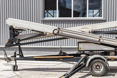 Construction telescopic tower or work platform for people to work at height.  Stock Photos