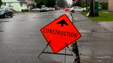Construction Temporary Road Sign on a Street. 4k. Slow Motion. Stock Footage 145298033