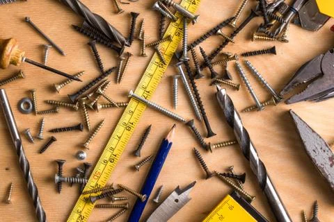 Construction theme. Working Tool on a Wooden Background. Stock Photos