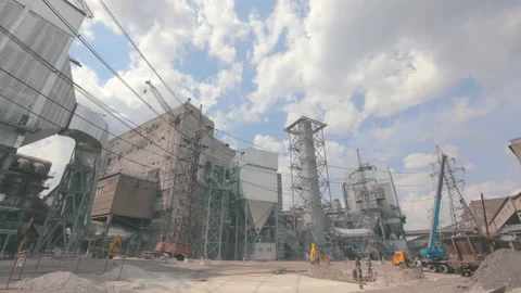 Construction time laps on the background of beautiful clouds. Specialized Stock Footage 230128343