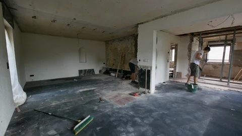 Construction time lapse - two young worker men removing laminate from the floor Stock Footage 91153823