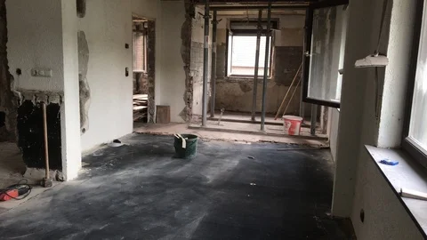 Construction time lapse - two young worker men removing laminate from the floor Stock Footage 91187503