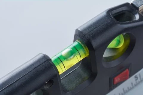 Construction tool Bubble spirit level on white background. Balance concept. Stock Photos