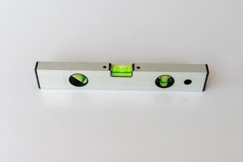 Construction tool for leveling floor and walls on white isolated background Stock Photos