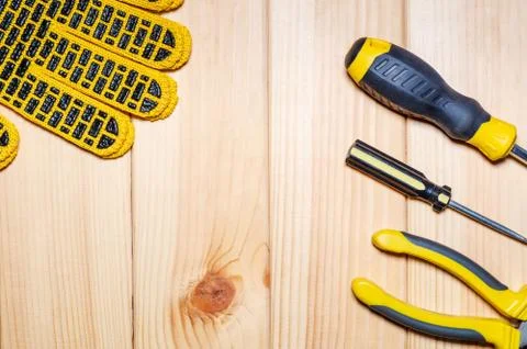Construction tool on wood board maintenance concept. Stock Photos