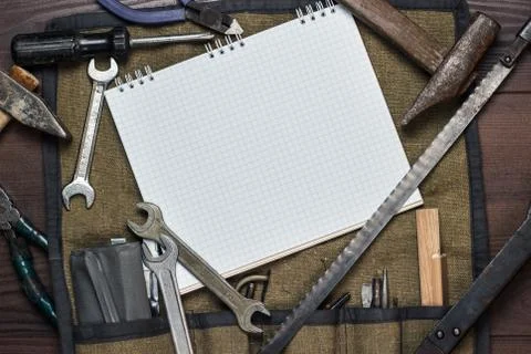 Construction tools and blank notepad Stock Photos
