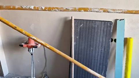 Construction Tools and Electrical Wiring in an Unfinished Interior 動画素材 346873688