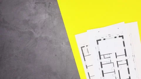 Construction tools and plans for building appear. Stop motion Stock Footage 136919084