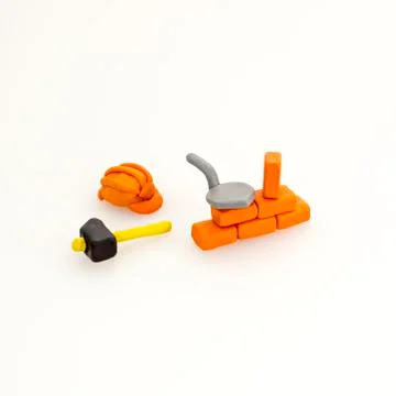 Construction tools and wall from red bricks 스톡 사진