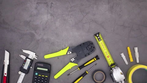 Construction tools appear on bottom of dark theme. Stop motion Stock Footage 136919060