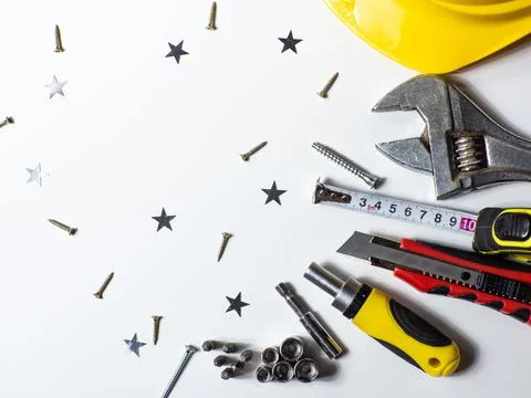 Construction tools, hard hat on white background with copy space Stock Photos