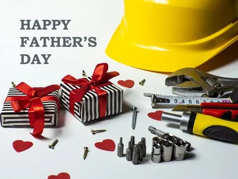 Construction tools, hard hat on white background with Happy Fathers day Stock Photos