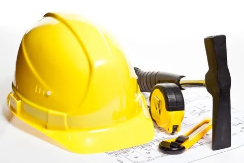 Construction tools, hardhat and blueprint Stock Photos