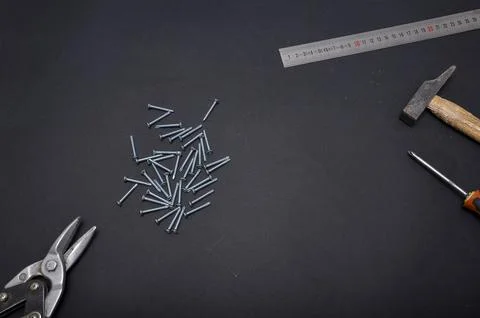 Construction tools layout featuring hammer, screws, ruler, screwdriver and .. Stock Photos