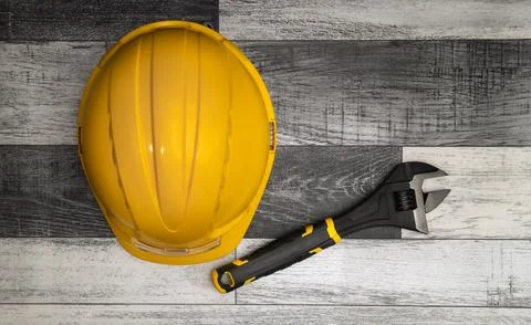Construction tools placed on a wooden surface, ready for use Stock Photos
