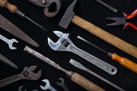 Construction tools set on dark background. Assortment instrument Stock Photos