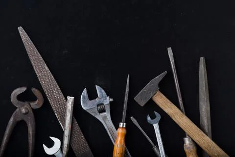 Construction tools set on dark background. Assortment instruments for repairman Foto stock